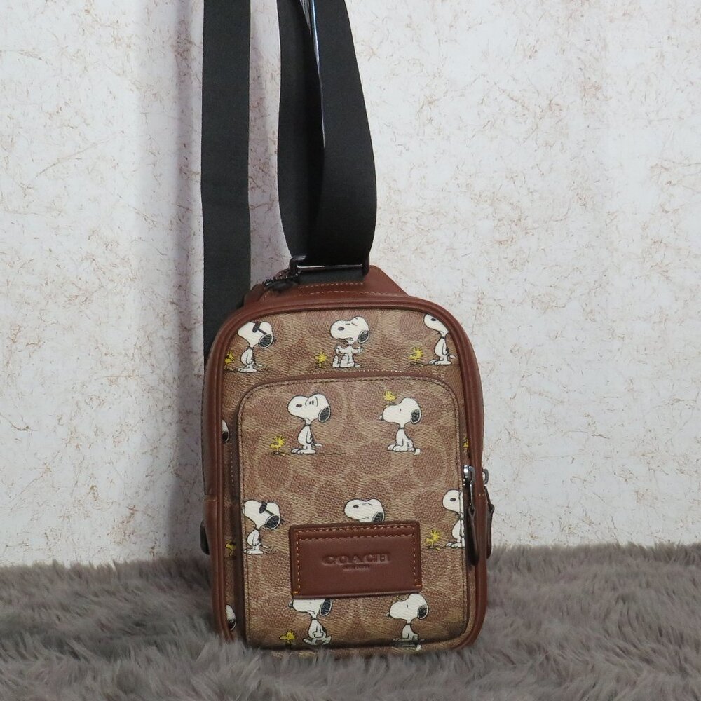 Coach Signature Snoopy Racer Sling Pack (Tan)
